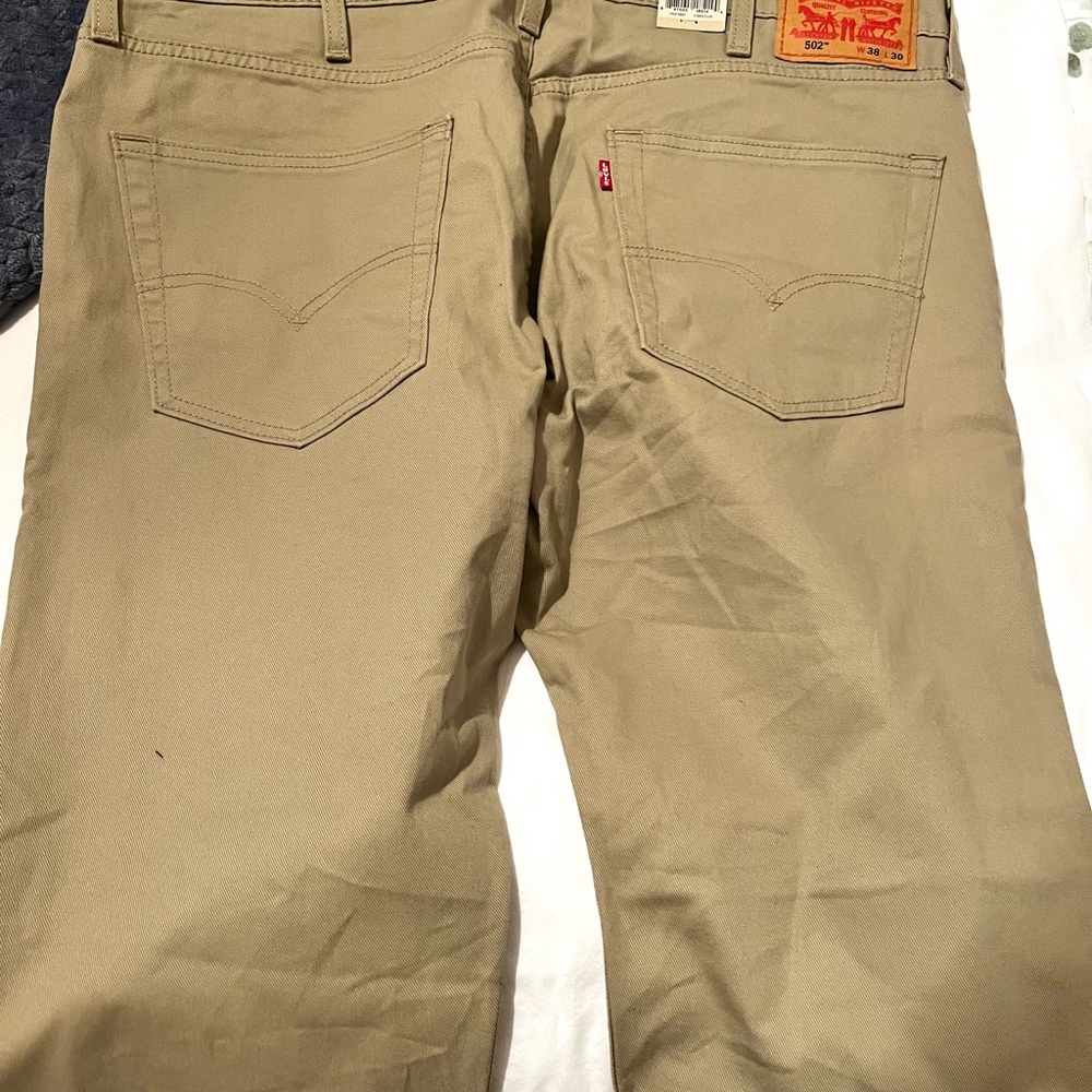 Men’s khaki/tan color 502 Levi jeans, NWT, 38 x 30, stretch, tapered, brand new!